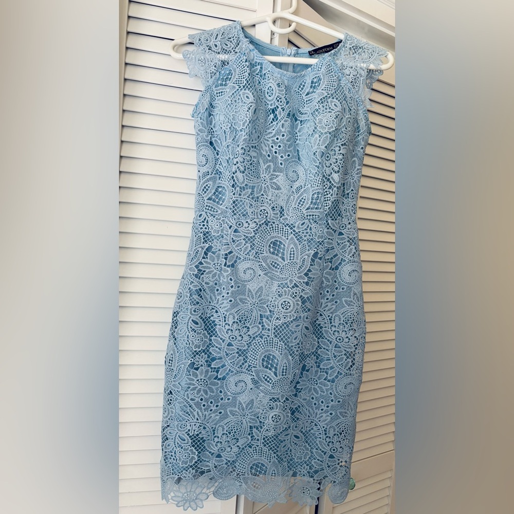 Elegant Light Blue Lace Dress. Fully lined with built in bra. Bought in Europe.
